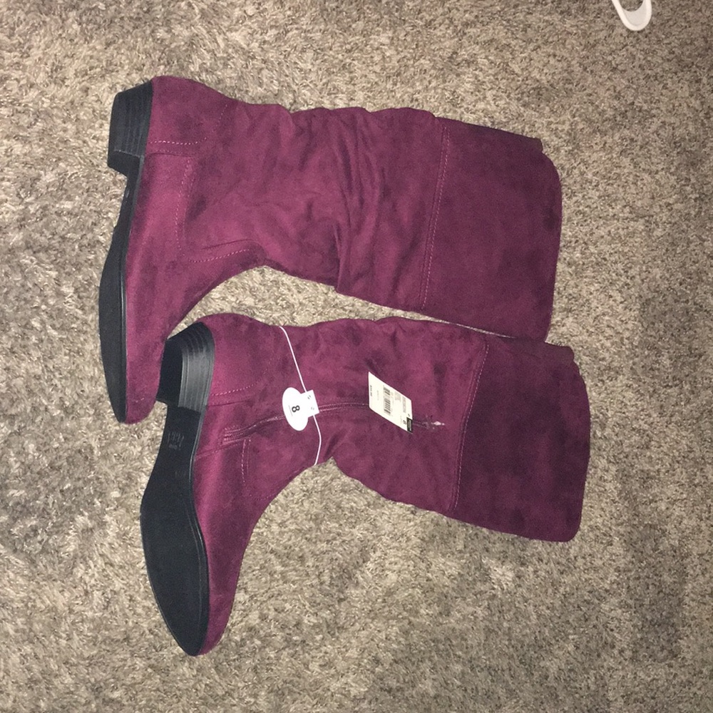 Wine colored size 8 under the knee boots.